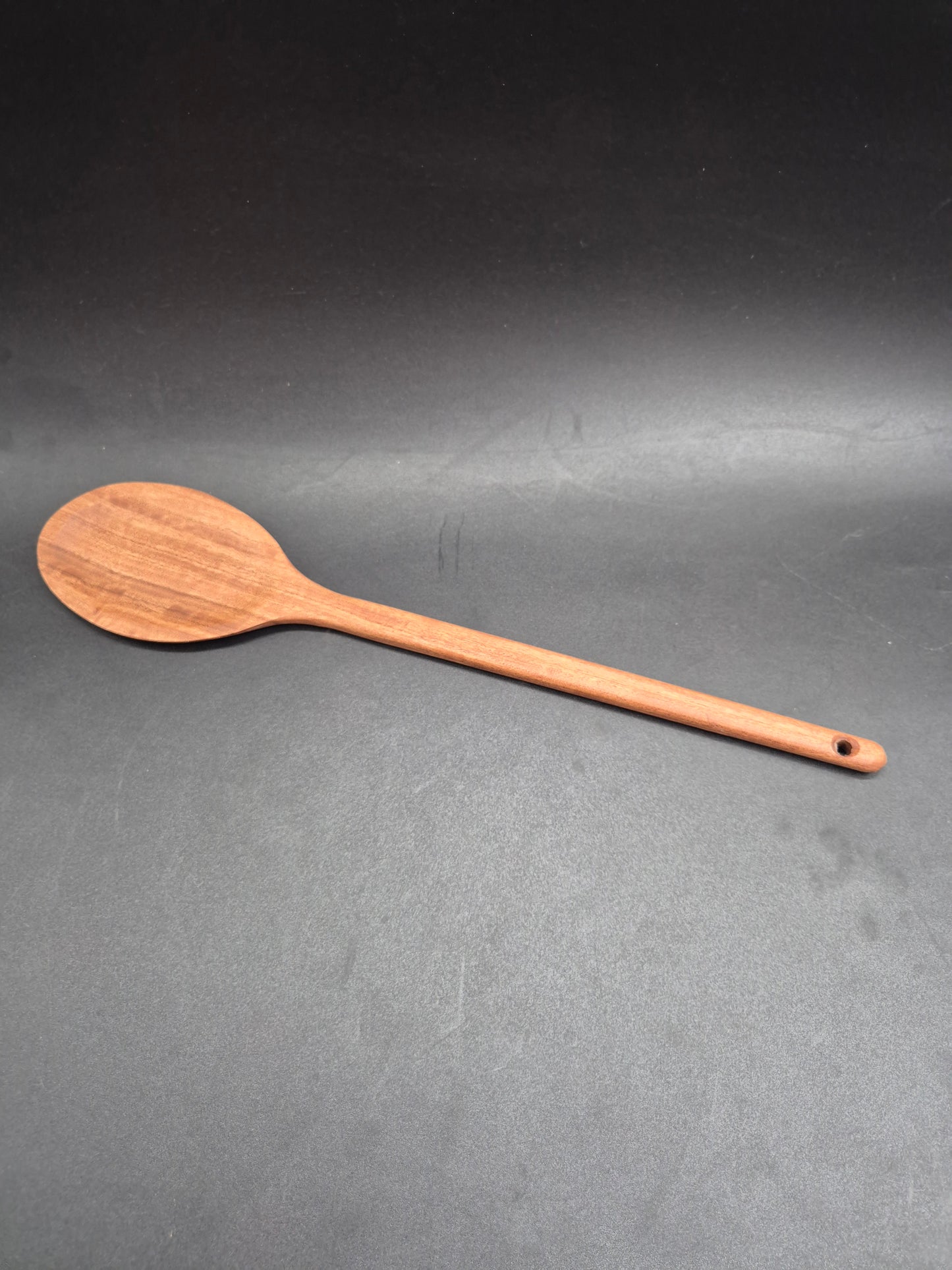 Handmade Yellow Box mixing spoon with a straight edge, crafted from timber sourced from the Inverell NSW area. These kitchen utensils are proudly made in Australia using Australian hardwoods and are shaped from one solid piece of timber with no glues or joins.
Each spoon is carefully handcrafted and finished with our organic oil, making it non-toxic, food safe, and ready for everyday use. Strong, durable, and naturally beautiful, this handmade mixing spoon is built to last and designed to become a staple i