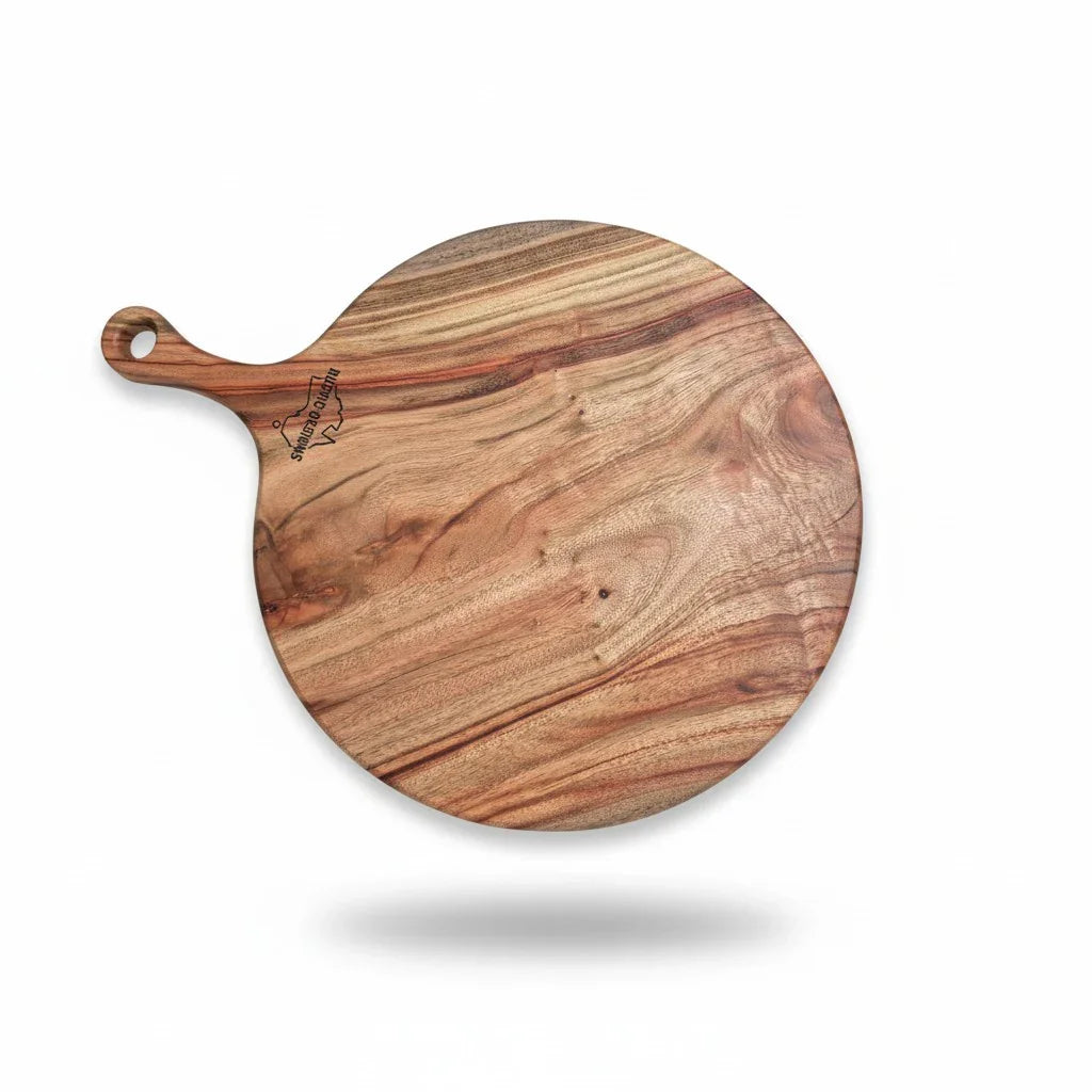 Australian made chopping board, pizza board, Camphor Laurel chopping board, solid timber chopping board, handmade chopping board, wooden serving board, grazing board, charcuterie board, large serving board, non-toxic chopping board, low-tox kitchenware, eco-friendly kitchenware, food-safe chopping board, sustainable timber kitchenware, Australian hardwood chopping board, one piece chopping board, no glues no joins, handmade wooden board.