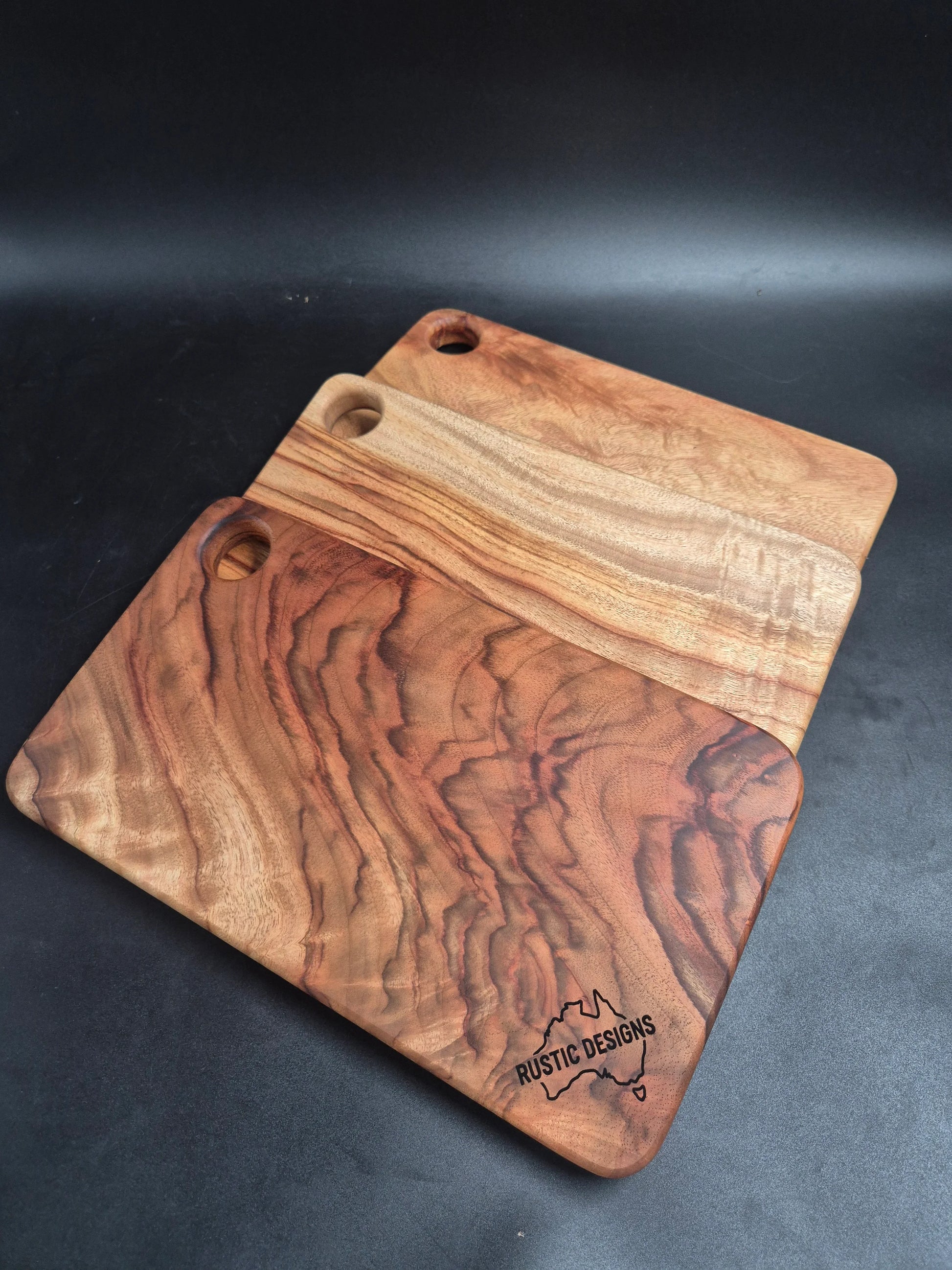  Australian made chopping board, small chopping board, Camphor Laurel chopping board, solid timber chopping board, handmade chopping board, wooden serving board, grazing board, charcuterie board, non-toxic chopping board, low-tox kitchenware, eco-friendly kitchenware, food-safe chopping board, sustainable timber kitchenware, Australian hardwood chopping board, one piece chopping board, no glues no joins, handmade wooden board.