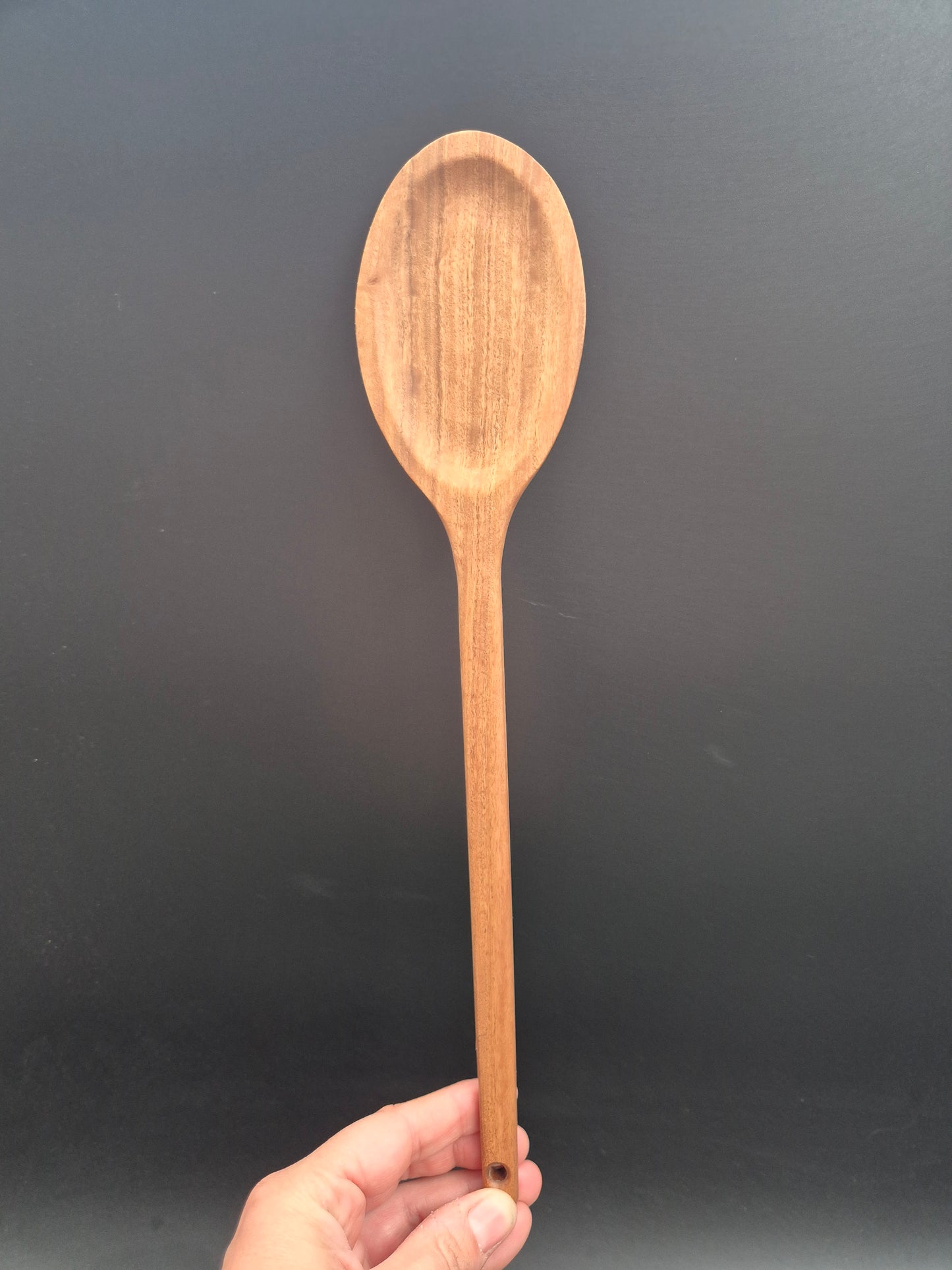Handmade Yellow Box mixing spoon with a straight edge, crafted from timber sourced from the Inverell NSW area. These kitchen utensils are proudly made in Australia using Australian hardwoods and are shaped from one solid piece of timber with no glues or joins.

Each spoon is carefully handcrafted and finished with our organic oil, making it non-toxic, food safe, and ready for everyday use. Strong, durable, and naturally beautiful, this handmade mixing spoon is built to last and designed to become a staple i