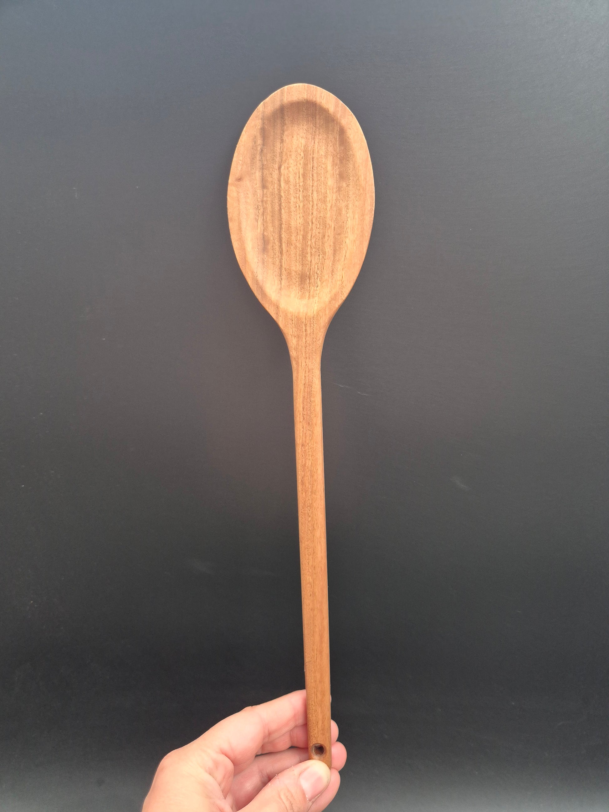 Handmade Yellow Box mixing spoon with a straight edge, crafted from timber sourced from the Inverell NSW area. These kitchen utensils are proudly made in Australia using Australian hardwoods and are shaped from one solid piece of timber with no glues or joins.

Each spoon is carefully handcrafted and finished with our organic oil, making it non-toxic, food safe, and ready for everyday use. Strong, durable, and naturally beautiful, this handmade mixing spoon is built to last and designed to become a staple i