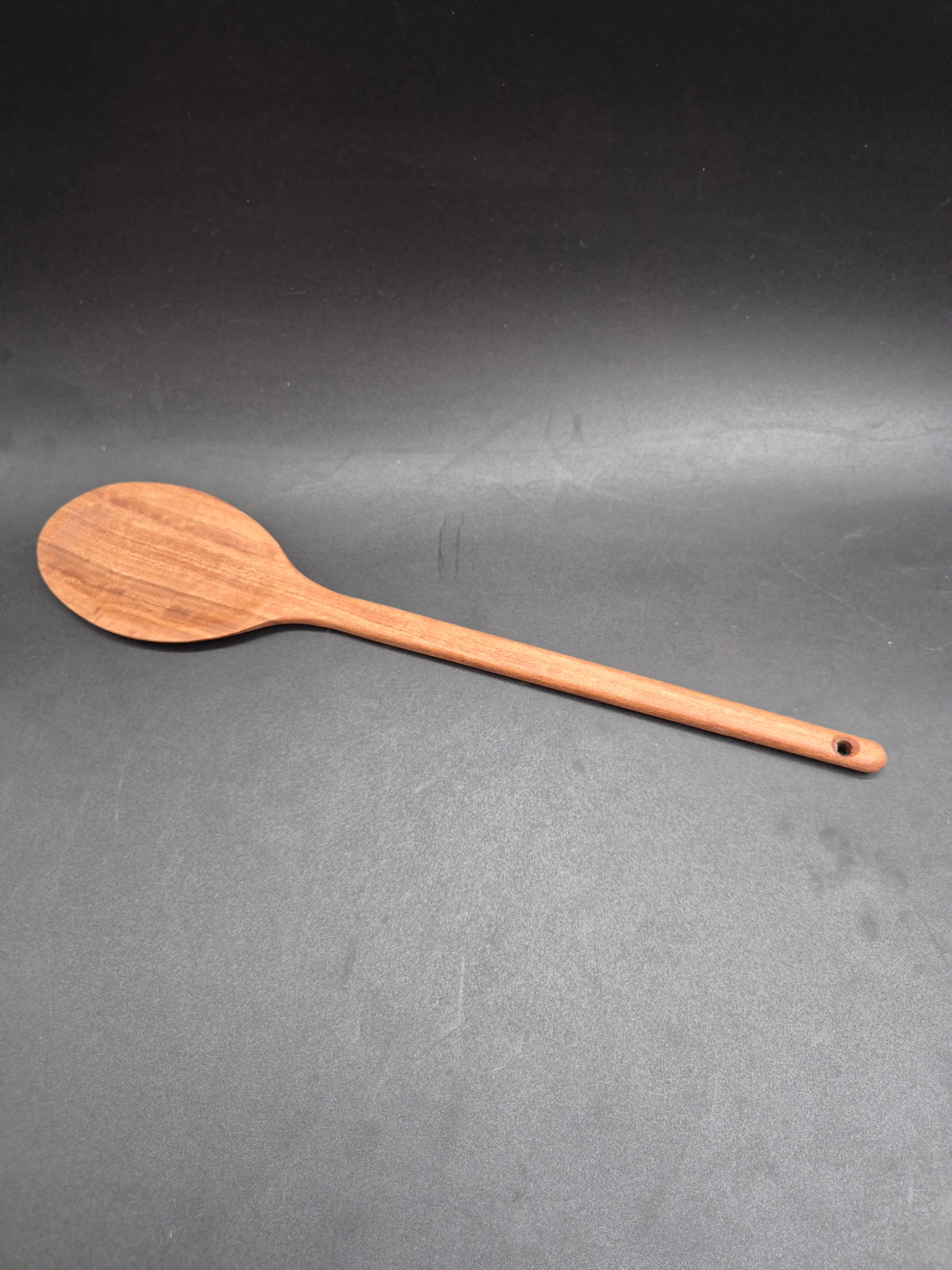 Handmade Yellow Box mixing spoon with a straight edge, crafted from timber sourced from the Inverell NSW area. These kitchen utensils are proudly made in Australia using Australian hardwoods and are shaped from one solid piece of timber with no glues or joins.

Each spoon is carefully handcrafted and finished with our organic oil, making it non-toxic, food safe, and ready for everyday use. Strong, durable, and naturally beautiful, this handmade mixing spoon is built to last and designed to become a staple i